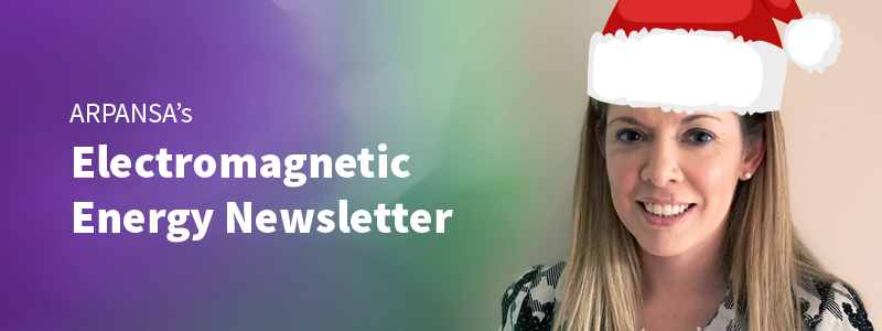 A woman wearing a santa hat with the text 'ARPANSA's Electromagnetic Energy Newsletter'